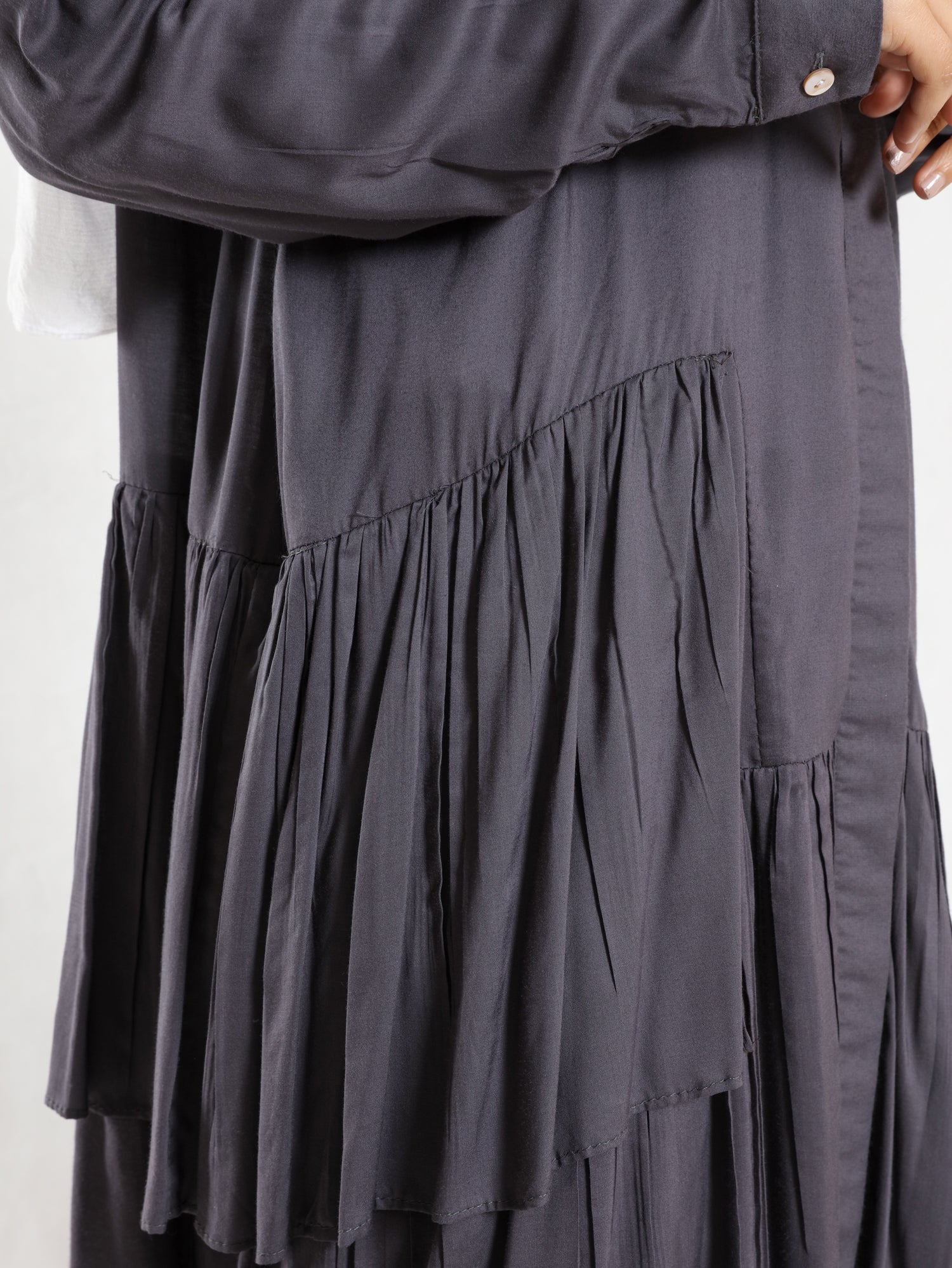 Ruffle Shirt in soft, breathable fabric with delicate frill accents, available in serene summer tones for a feminine modest look