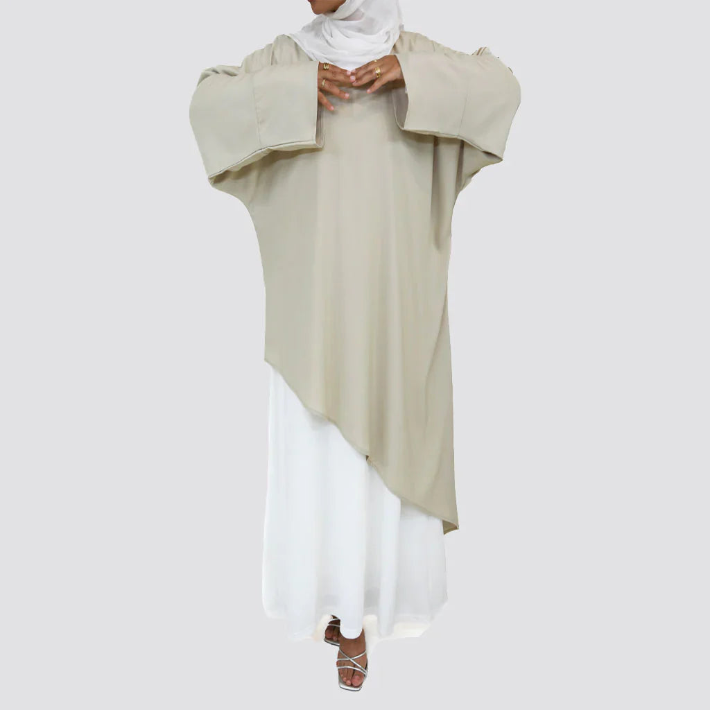 Asymmetrical Cascading Top in smooth crepe with one-sided floral print and draped silhouette, a playful free-size blouse in beige, black, mauve, or lime green