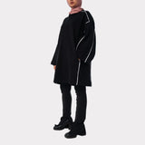 Basic Lines Shirt in cozy cotton with loose-fit silhouette and side pockets, a long-sleeved top in black or mustard for chic winter comfort