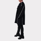 Basic Lines Shirt in cozy cotton with loose-fit silhouette and side pockets, a long-sleeved top in black or mustard for chic winter comfort