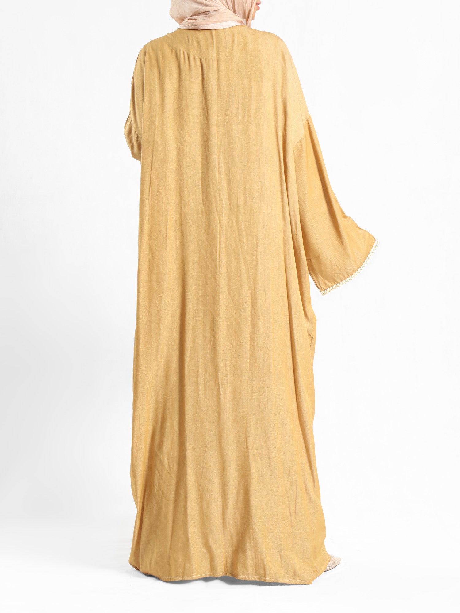 Boho Bliss Kaftan in satin crepe cotton with embroidered Indian tapes, featuring a free-size flowing design for vibrant, effortless modest style
