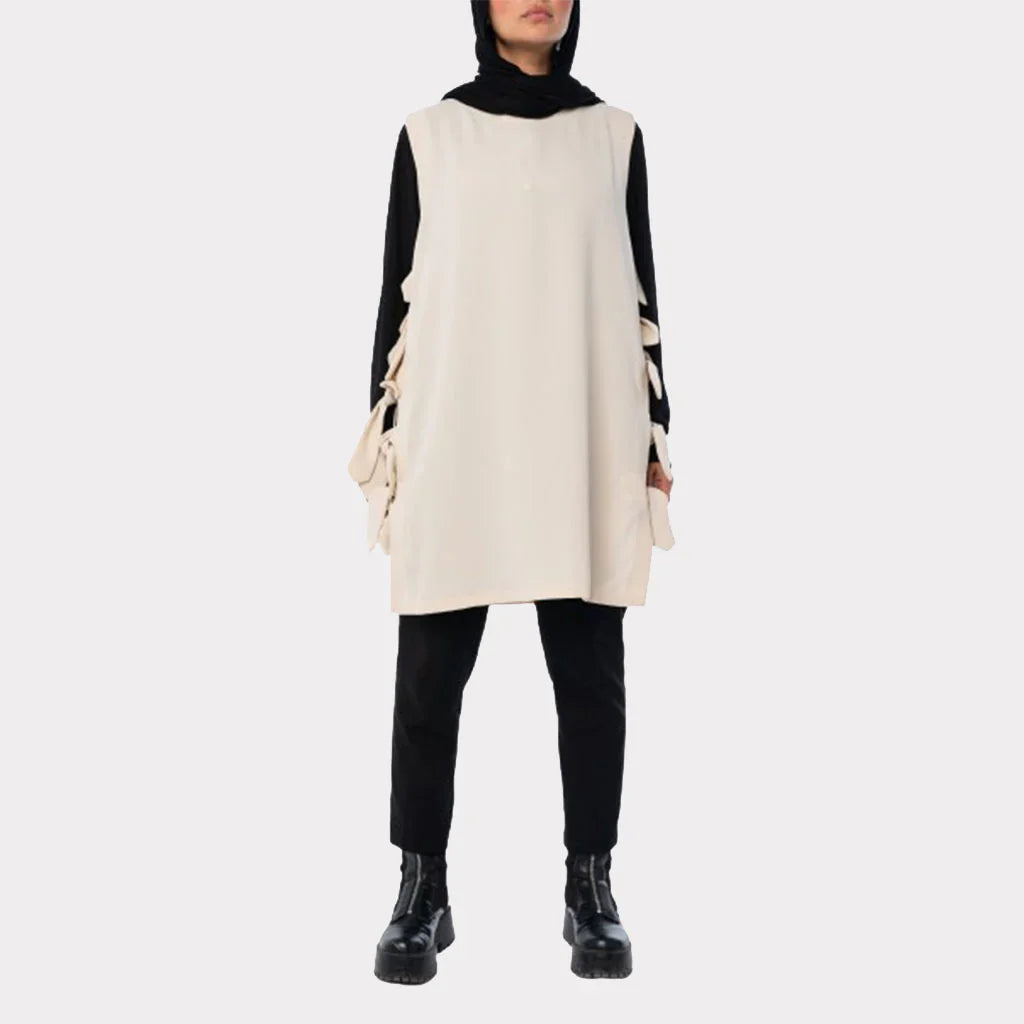 Bow Tie Vest in TR fabric with longline cut and chic side bows, an easy-to-style layering piece in green, black, red, or beige