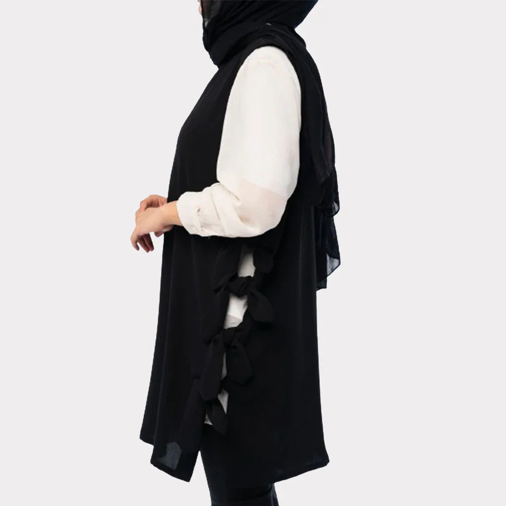 Bow Tie Vest in TR fabric with longline cut and chic side bows, an easy-to-style layering piece in green, black, red, or beige