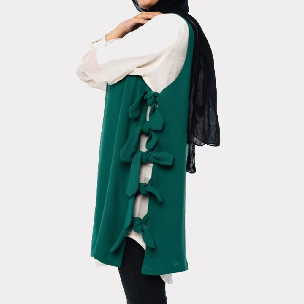 Bow Tie Vest in TR fabric with longline cut and chic side bows, an easy-to-style layering piece in green, black, red, or beige