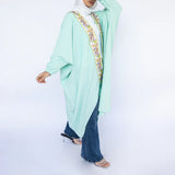 Colorful Cascade High-Low Kaftan in linen-cotton blend with shimmering polyester and flowy asymmetric hem—a modest free-size statement in lime green or baby blue