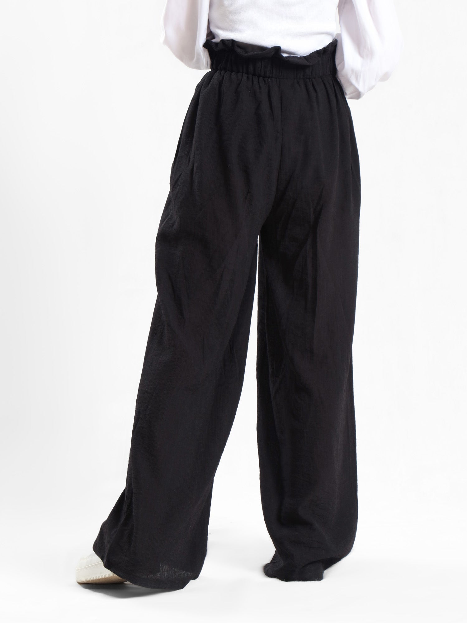 Effortless Bloom Pants in ripped viscose-cotton blend with relaxed wide-leg cut, offering breathable comfort for laid-back summer style