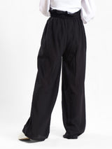 Effortless Bloom Pants in ripped viscose-cotton blend with relaxed wide-leg cut, offering breathable comfort for laid-back summer style