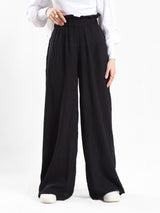 Effortless Bloom Pants in ripped viscose-cotton blend with relaxed wide-leg cut, offering breathable comfort for laid-back summer style