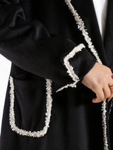 Elegant Suede Coat in black wool with engraved stitching, a long modest winter coat blending warmth, sophistication, and timeless style