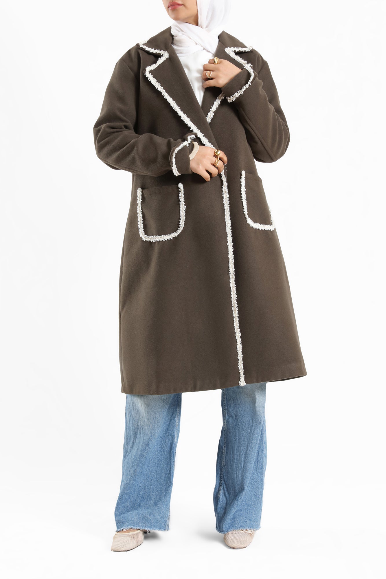 Elegant Wool Coat in warm wool fabric, available in olive and dark beige, blending modest style with seasonal comfort