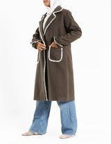 Elegant Wool Coat in warm wool fabric, available in olive and dark beige, blending modest style with seasonal comfort