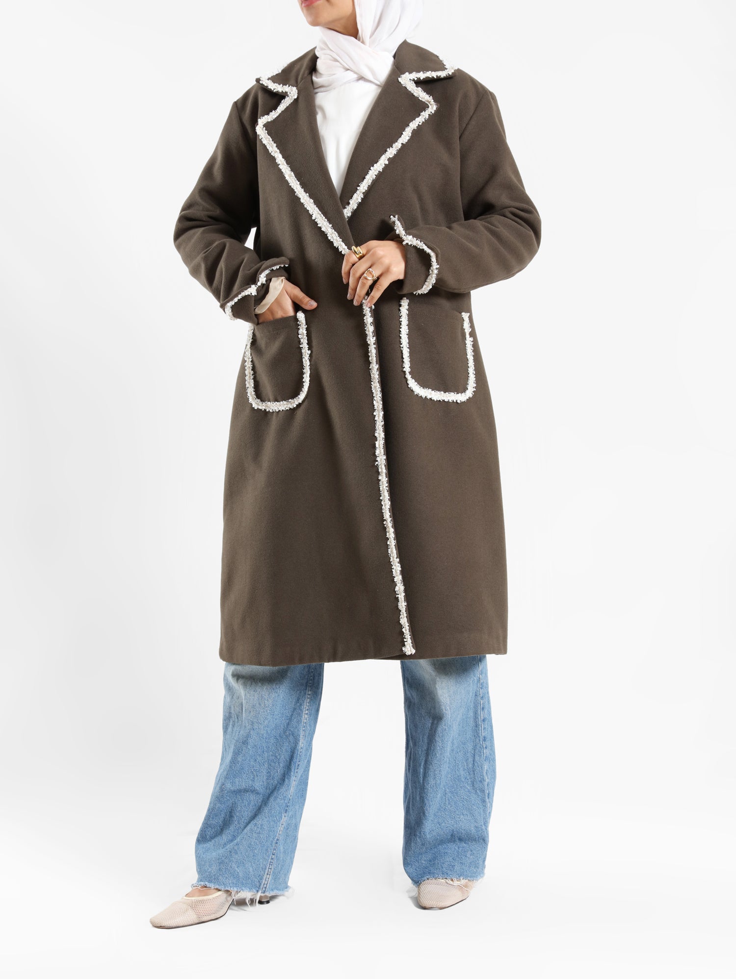 Elegant Wool Coat in warm wool fabric, available in olive and dark beige, blending modest style with seasonal comfort