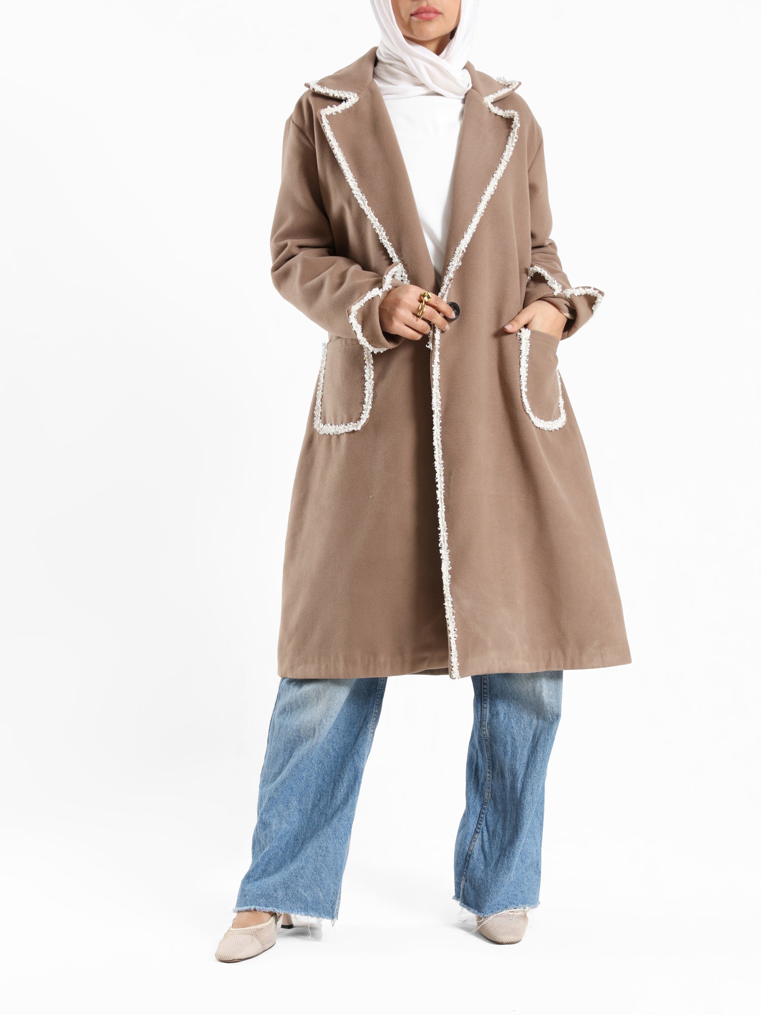 Elegant Wool Coat in warm wool fabric, available in olive and dark beige, blending modest style with seasonal comfort