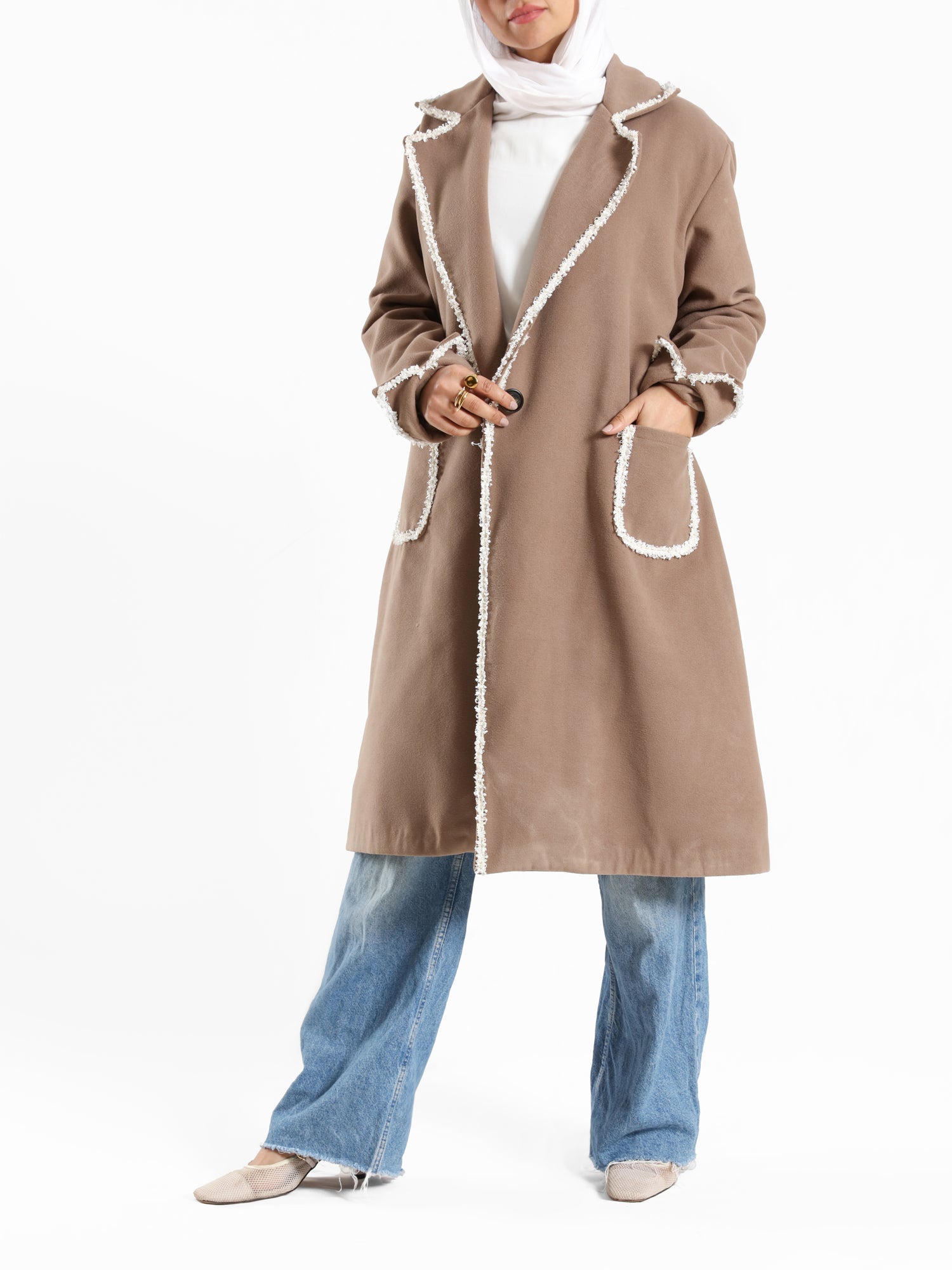 Elegant Wool Coat in warm wool fabric, available in olive and dark beige, blending modest style with seasonal comfort