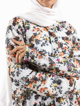 Floral Ruffle Shirt in voile fabric with modest ruffle design, available in white, purple, and yellow for summer wear
