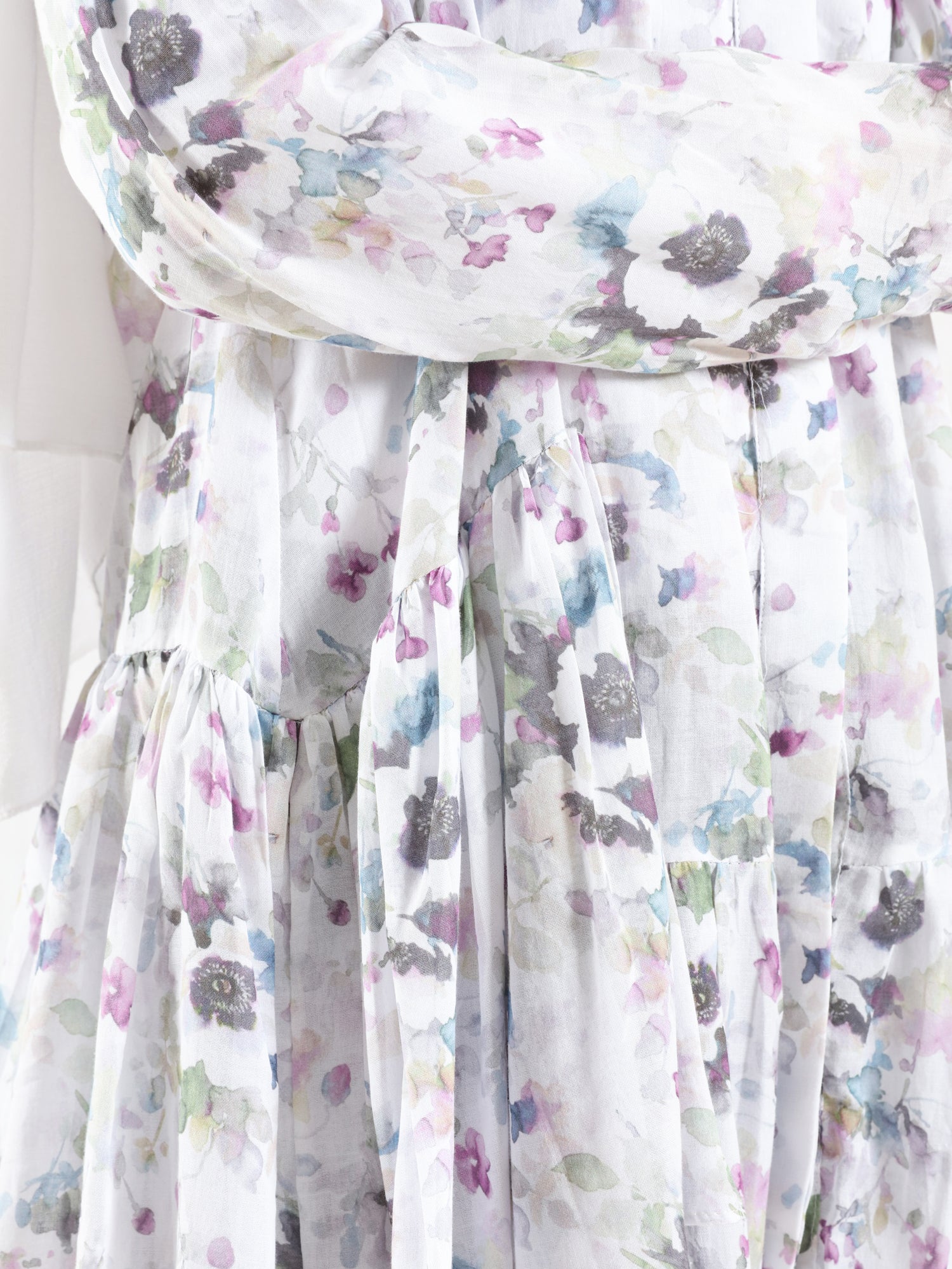 Floral Ruffle Shirt in voile fabric with modest ruffle design, available in white, purple, and yellow for summer wear