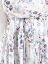 Floral Ruffle Shirt in voile fabric with modest ruffle design, available in white, purple, and yellow for summer wear