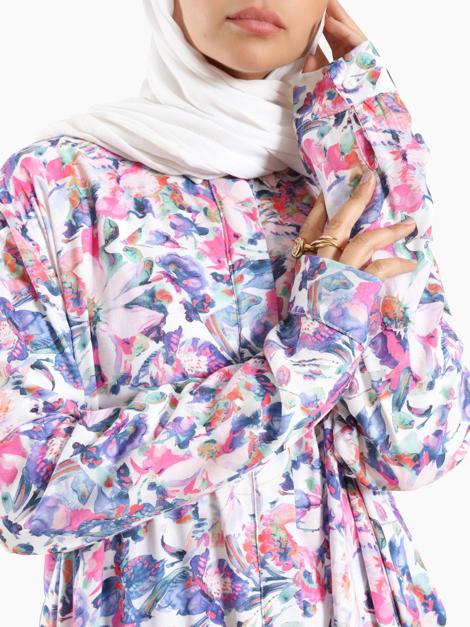 Floral Ruffle Shirt in voile fabric with modest ruffle design, available in white, purple, and yellow for summer wear