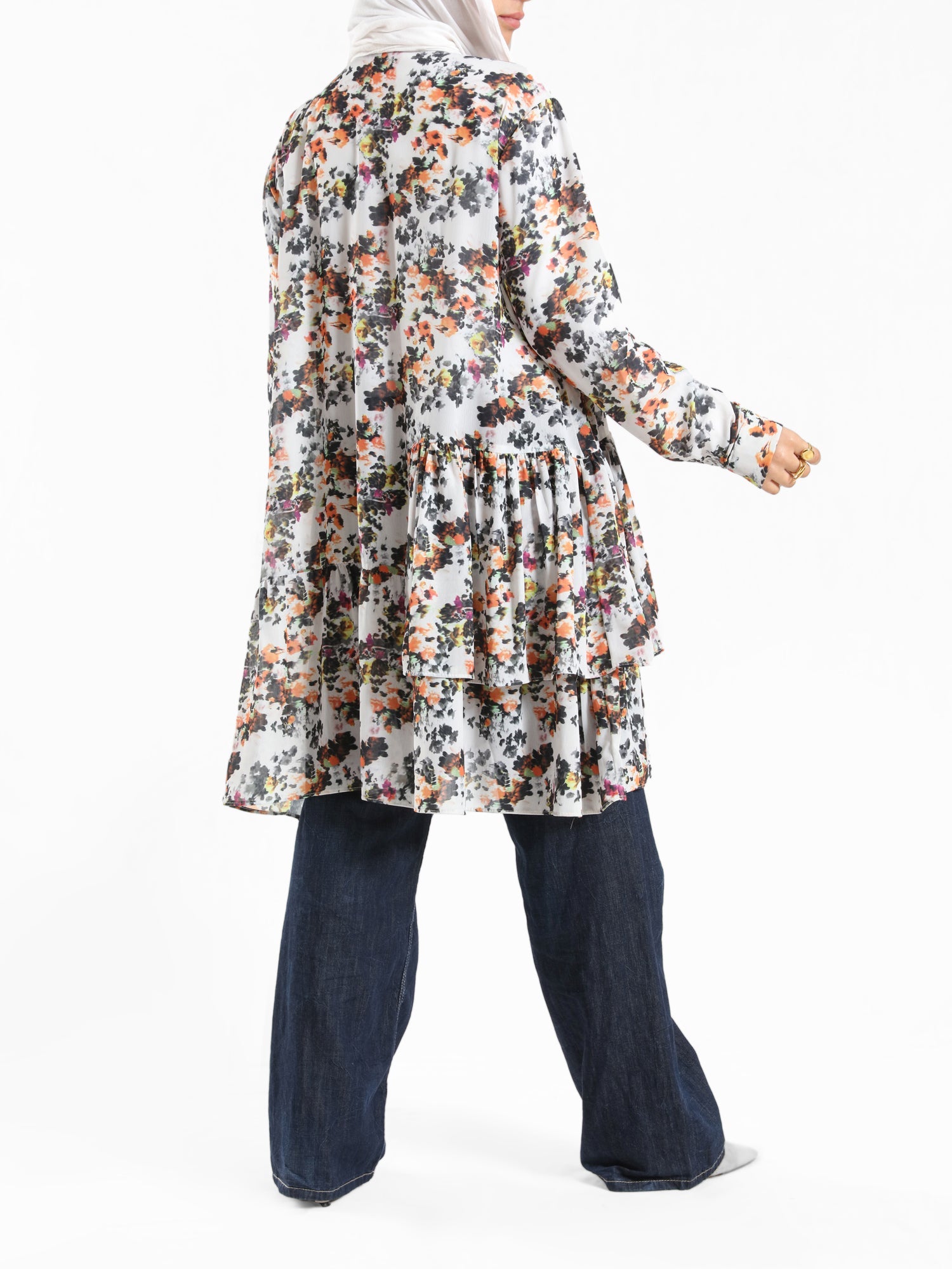 Floral Ruffle Shirt in voile fabric with modest ruffle design, available in white, purple, and yellow for summer wear