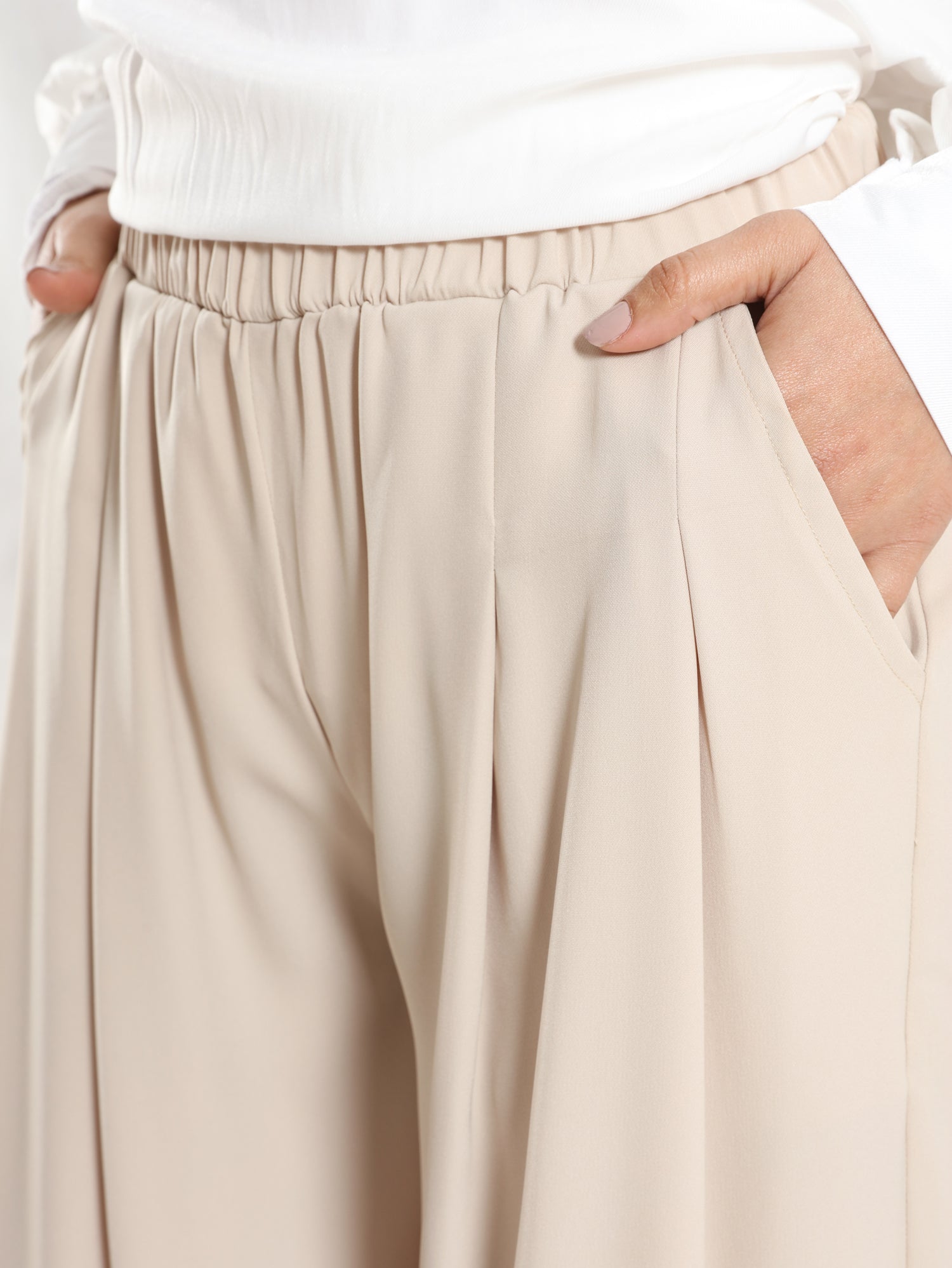 Floret Twirl Pants in airy viscose blend with wide-leg cut and high-rise waist, a breezy summer staple in turquoise, black, or beige