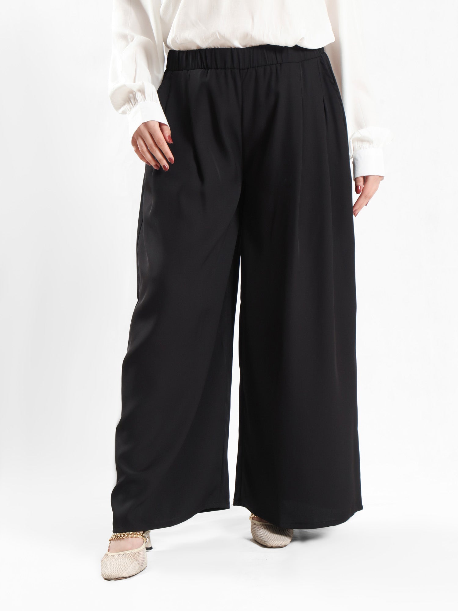 Floret Twirl Pants in breezy viscose blend with flowy wide-leg silhouette and high-rise waist, designed for modest summer comfort