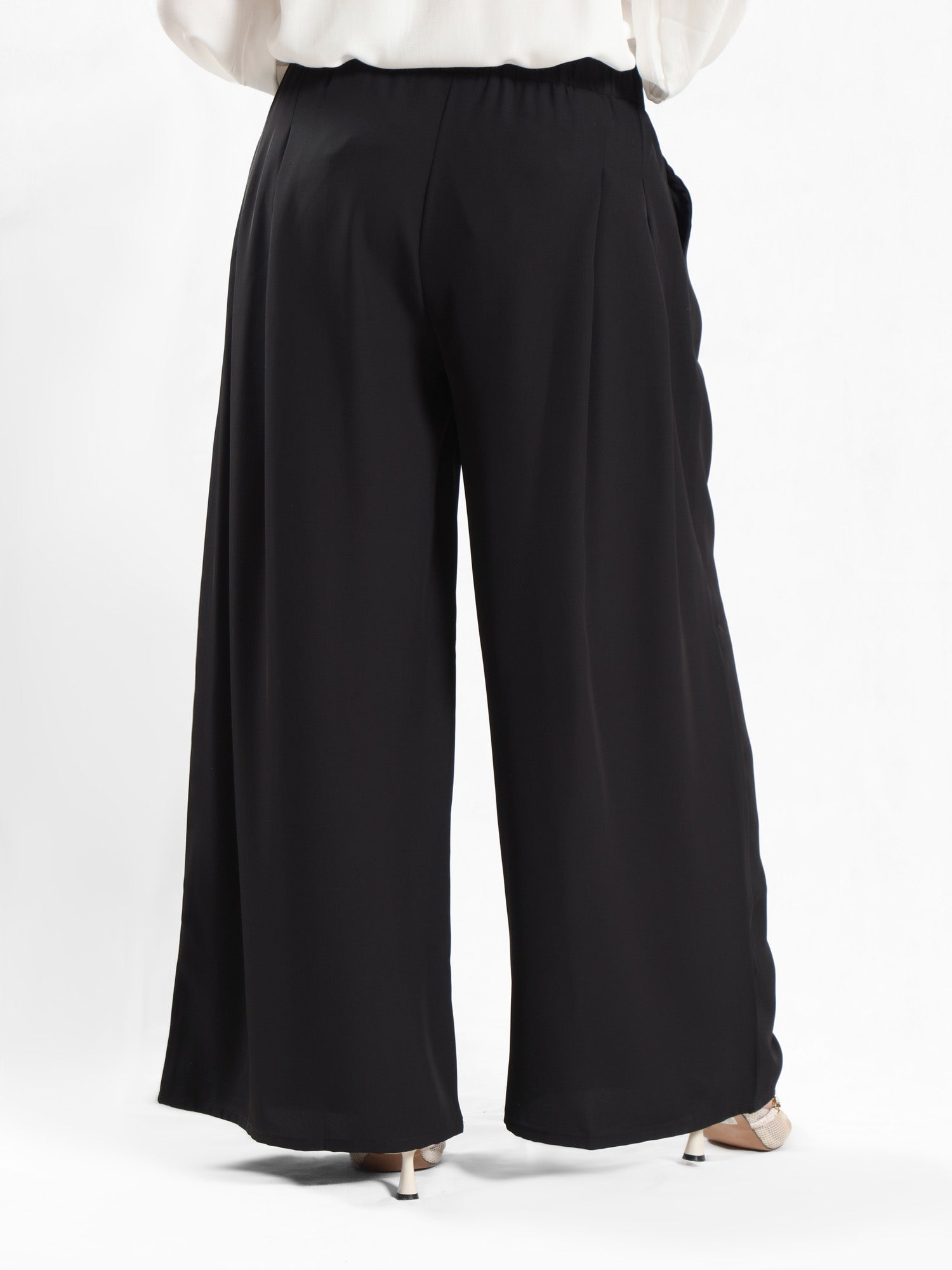 Floret Twirl Pants in breezy viscose blend with flowy wide-leg silhouette and high-rise waist, designed for modest summer comfort