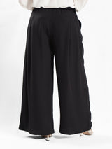 Floret Twirl Pants in breezy viscose blend with flowy wide-leg silhouette and high-rise waist, designed for modest summer comfort
