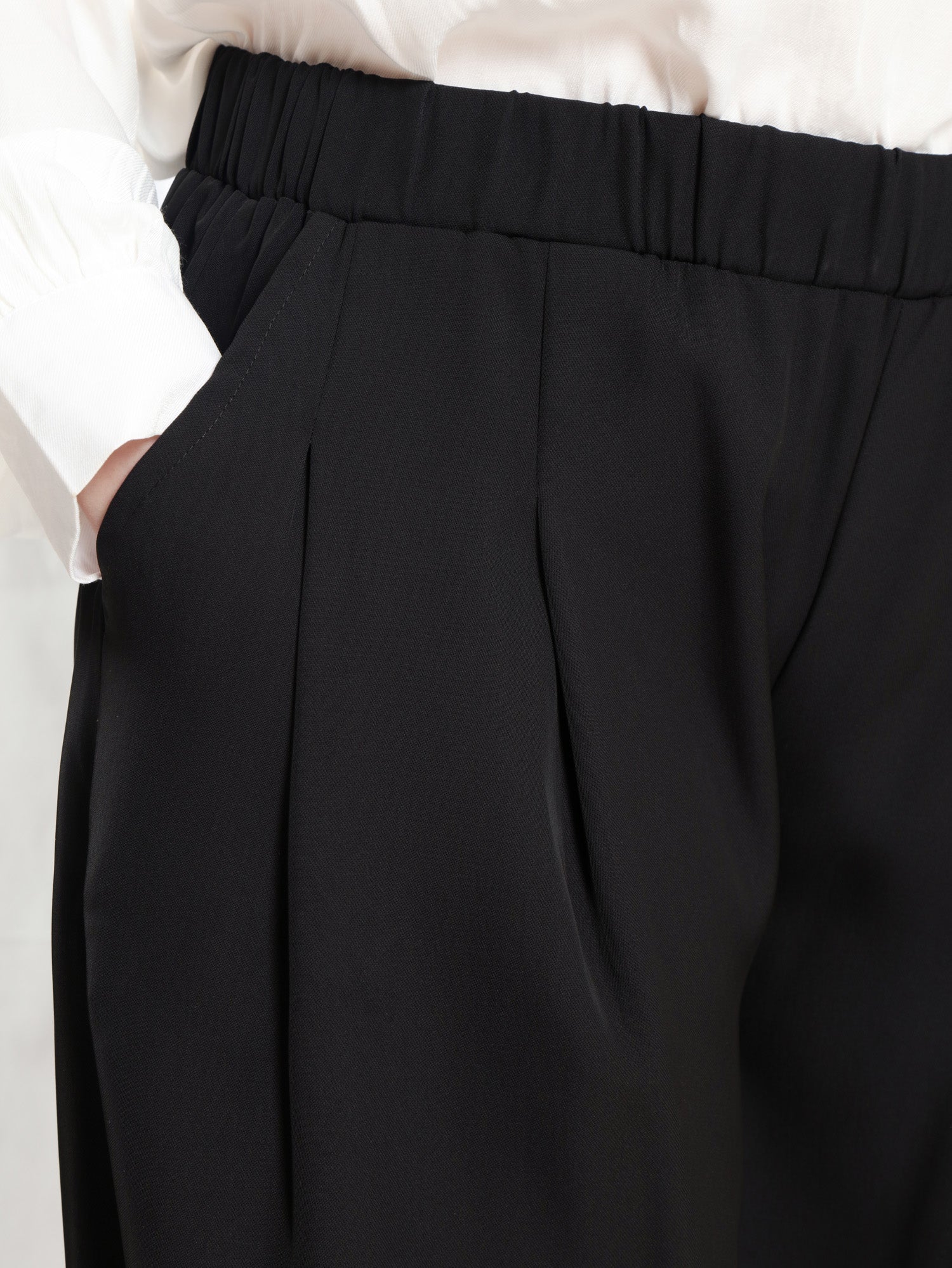 Floret Twirl Pants in breezy viscose blend with flowy wide-leg silhouette and high-rise waist, designed for modest summer comfort