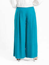 Floret Twirl Pants in wide-leg fit, available in turquoise, black, and beige—lightweight and modest for summer styling