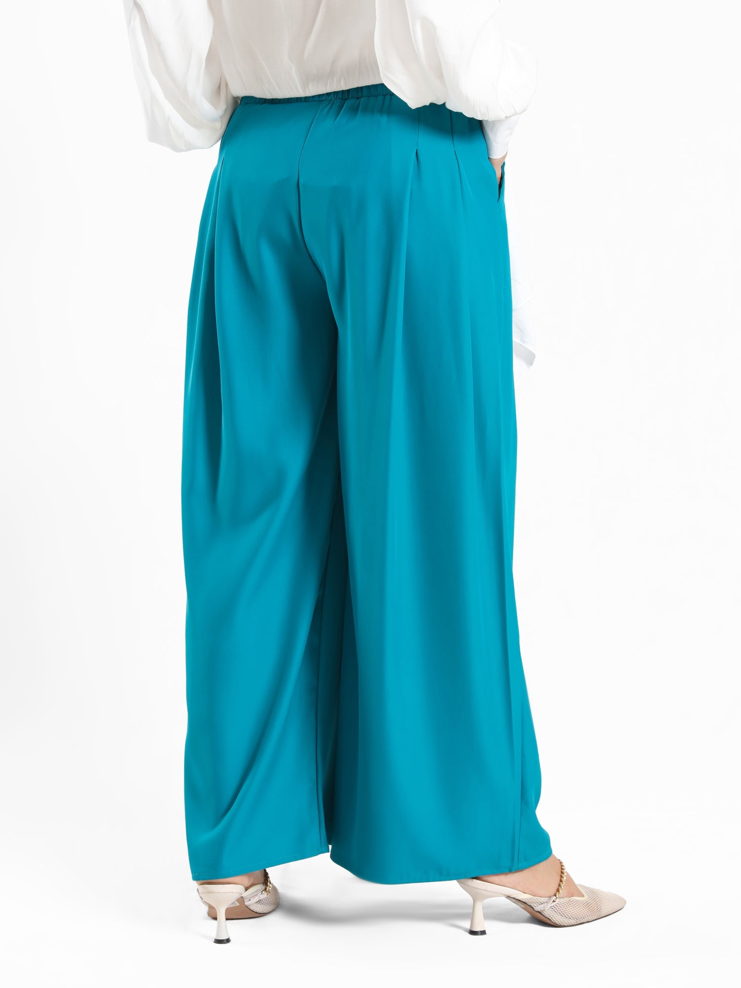 Floret Twirl Pants in wide-leg fit, available in turquoise, black, and beige—lightweight and modest for summer styling