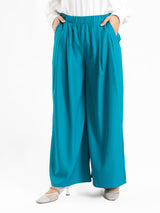 Floret Twirl Pants in wide-leg fit, available in turquoise, black, and beige—lightweight and modest for summer styling