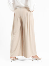 Floret Twirl Pants in airy viscose blend with wide-leg cut and high-rise waist, a breezy summer staple in turquoise, black, or beige