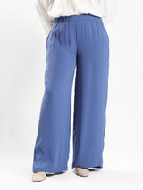 Glory Pants in airy fabric with skirt-like silhouette and wide-leg flow, designed for confident twirls and elegant summer wear