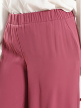 Glory Pants in airy fabric with skirt-like silhouette and wide-leg flow, designed for confident twirls and elegant summer wear