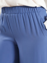 Glory Pants in airy fabric with skirt-like silhouette and wide-leg flow, designed for confident twirls and elegant summer wear