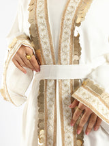 Golden Jewel Kaftan in Turkish linen-cotton blend, featuring a vibrant design and breathable comfort for modest elegance