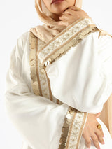 Golden Jewel Kaftan in Turkish linen-cotton blend, featuring a vibrant design and breathable comfort for modest elegance