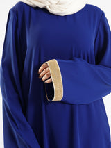 Golden Trim Bloom Set in 100% cotton spectra fabric with high-low top and wide-leg pants, a breezy modest outfit for Eid or summer gatherings in blue, fuchsia, or green