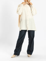 Linen Blouse in breathable beige linen with long sleeves, a modest summer essential