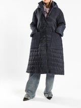 Long waterproof puffer coat with quilted texture and full coverage, ideal for modest winter wear in navy, beige, or grey