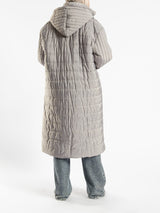 Long waterproof puffer coat with quilted texture and full coverage, ideal for modest winter wear in navy, beige, or grey