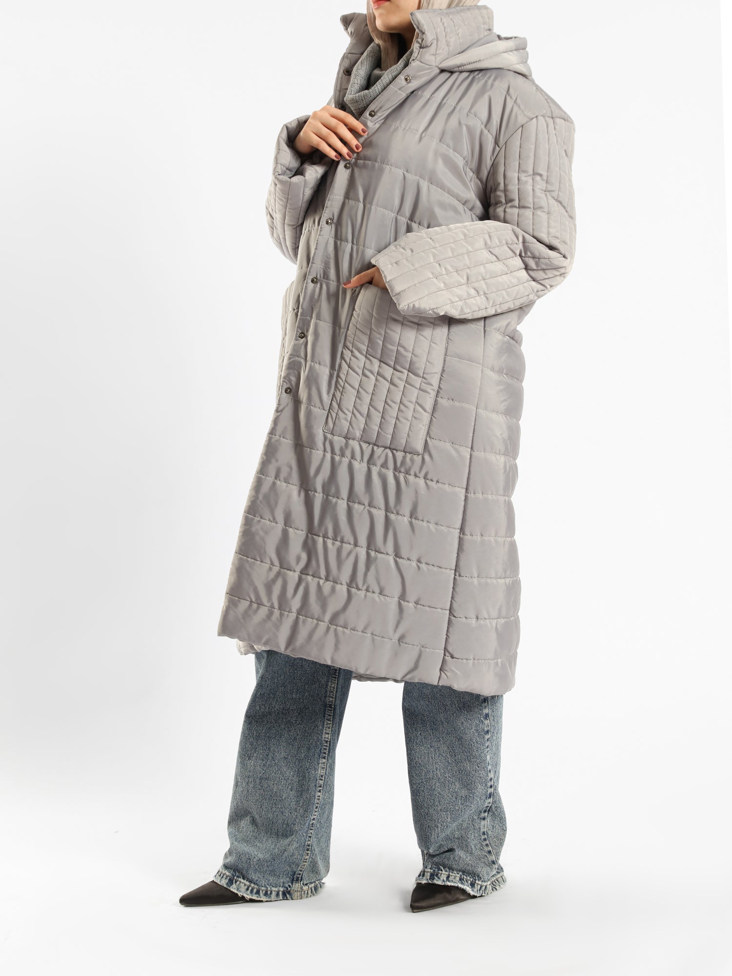 Long waterproof puffer coat with quilted texture and full coverage, ideal for modest winter wear in navy, beige, or grey