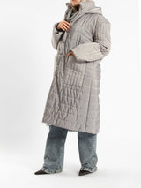 Long waterproof puffer coat with quilted texture and full coverage, ideal for modest winter wear in navy, beige, or grey