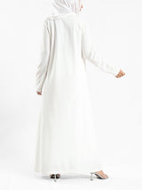 Minimalist Meadow Dress in pure cotton with long sleeves, a modest silhouette for everyday summer wear