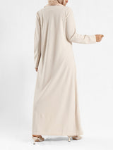Minimalist Meadow Dress in pure cotton with long sleeves, a modest silhouette for everyday summer wear