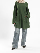 Oversized Pocketed Sweater in dark green, orange, gray, or green—relaxed fit with front pockets for bold winter layering