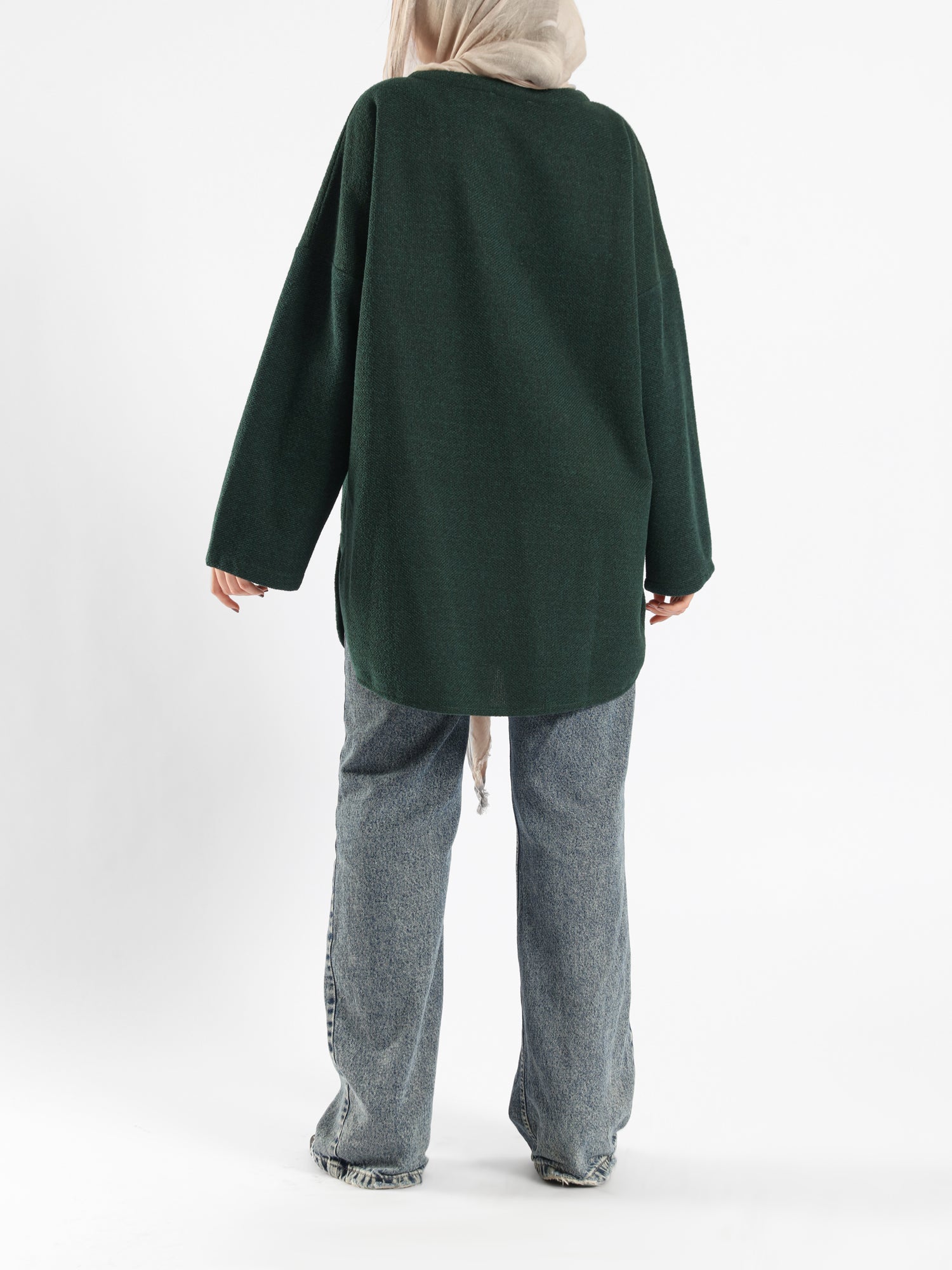 Oversized Pocketed Sweater in dark green, orange, gray, or green—relaxed fit with front pockets for bold winter layering