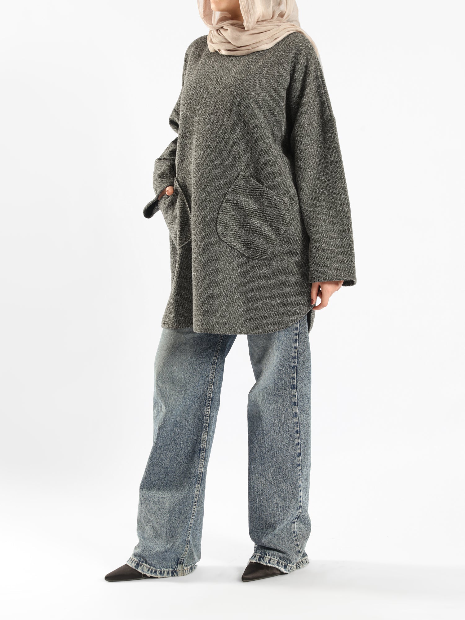 Oversized Pocketed Sweater in dark green, orange, gray, or green—relaxed fit with front pockets for bold winter layering