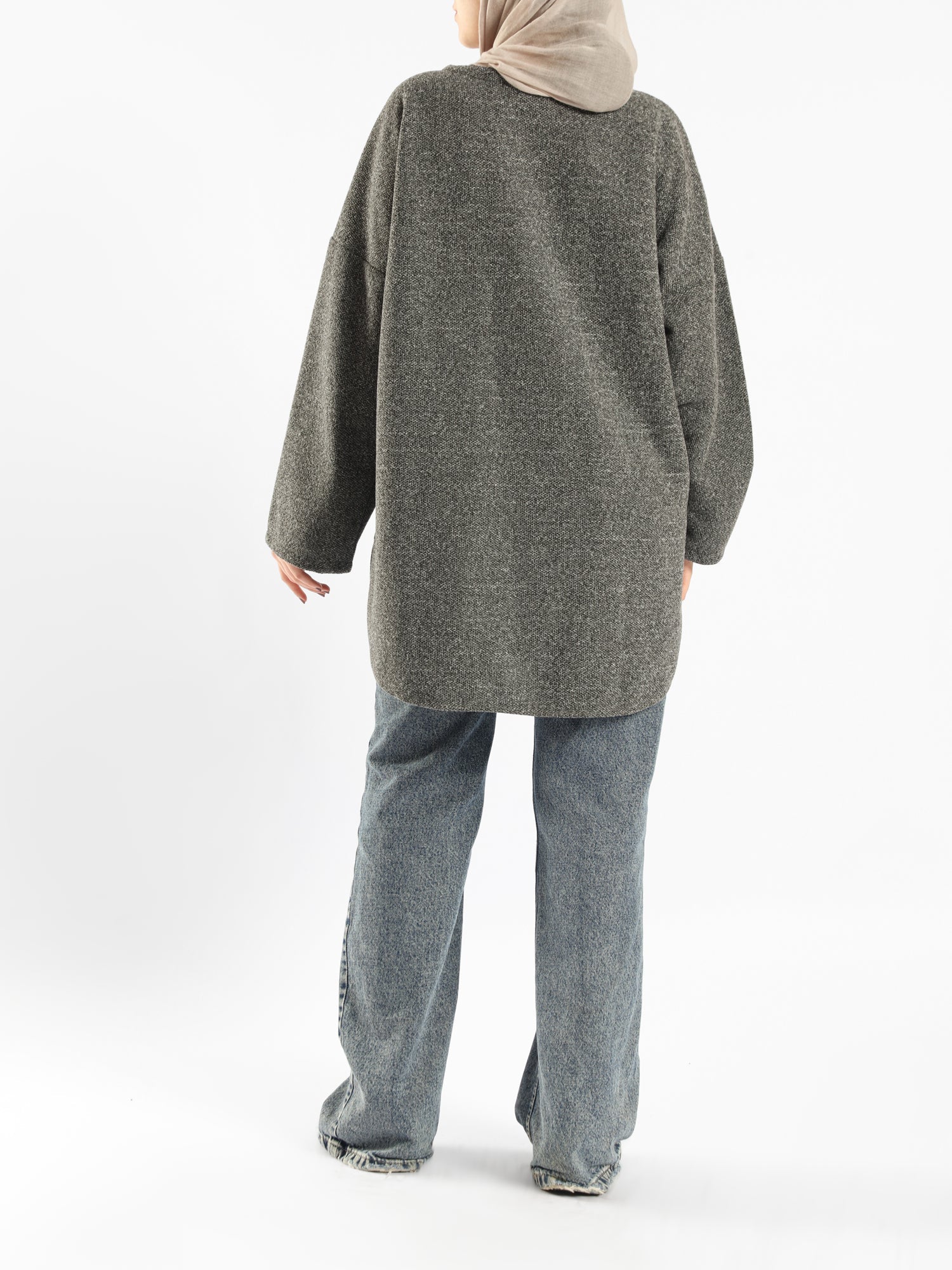 Oversized Pocketed Sweater in dark green, orange, gray, or green—relaxed fit with front pockets for bold winter layering