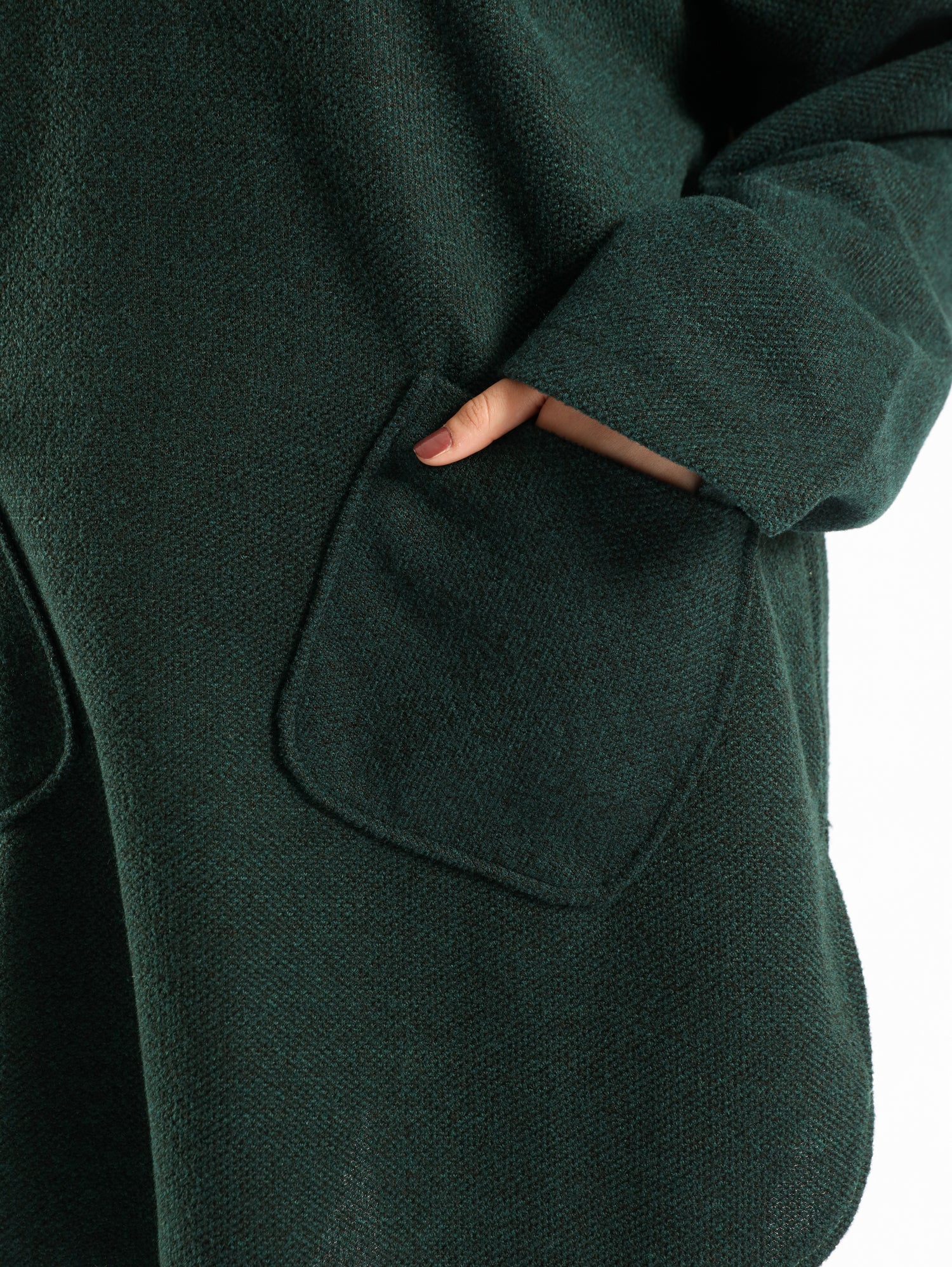 Oversized Pocketed Sweater in dark green, orange, gray, or green—relaxed fit with front pockets for bold winter layering